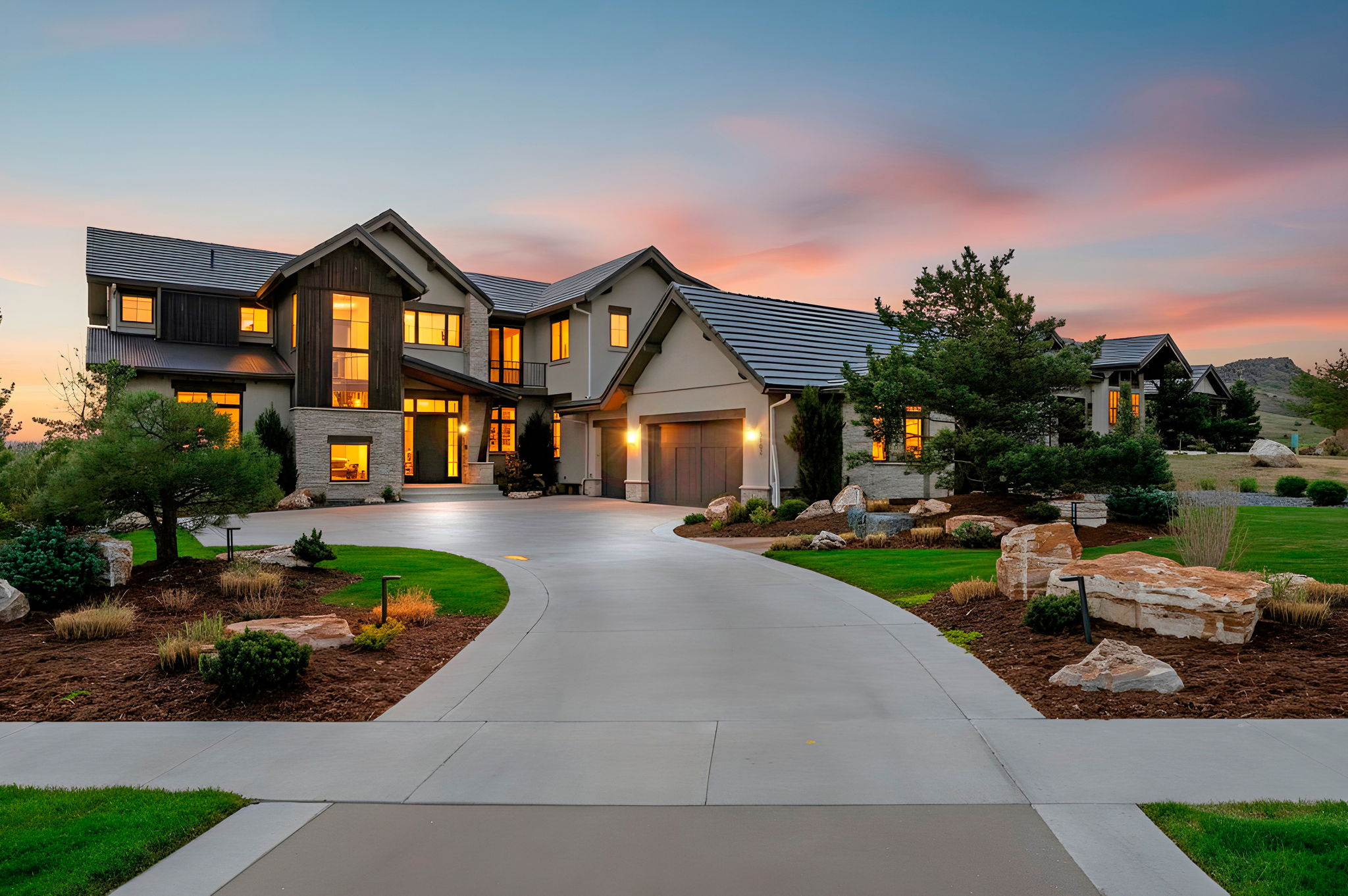 Montane custom home in the Colorado foothills at sunset